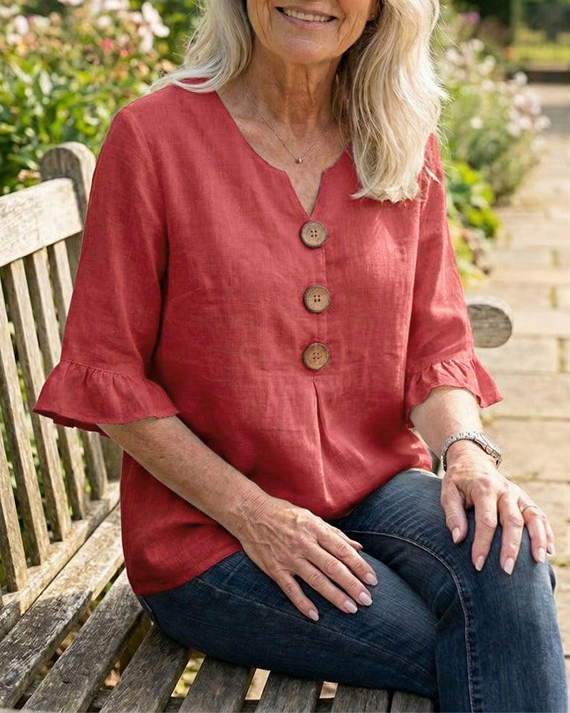 Sofía | Blusa de algodón-lino lisa con botones de madera y volantes