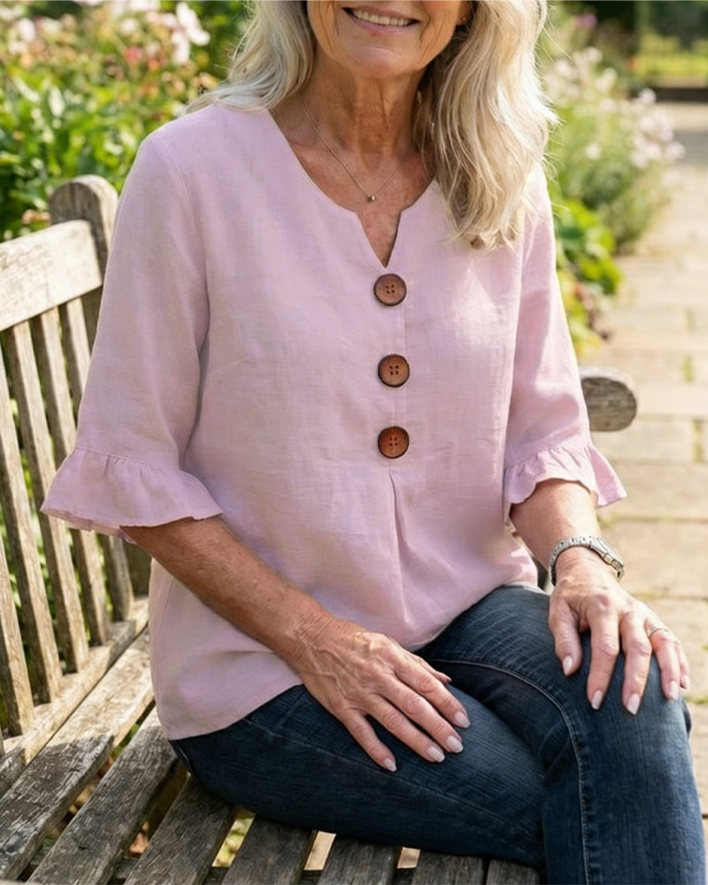 Sofía | Blusa de algodón-lino lisa con botones de madera y volantes