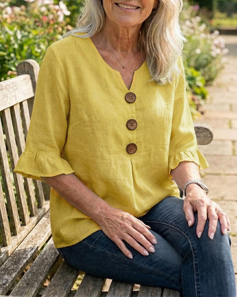 Sofía | Blusa de algodón-lino lisa con botones de madera y volantes