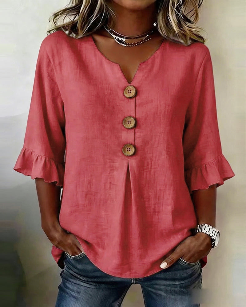 Sofía | Blusa de algodón-lino lisa con botones de madera y volantes